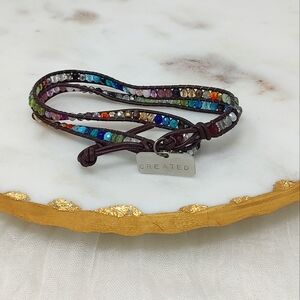 "Created" stamped charm, multi-color beads on woven brown cord wrap bracelet